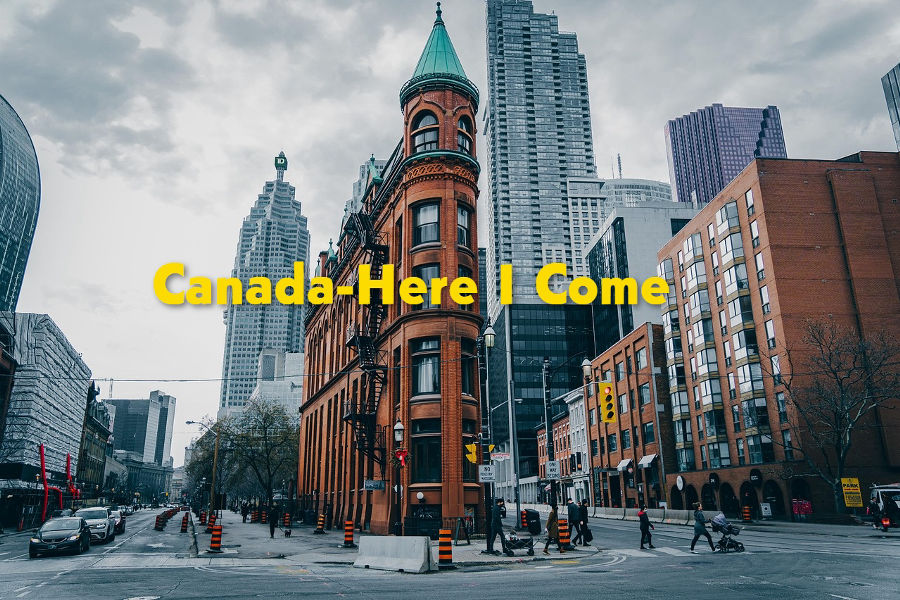 Scenic city view of Canada with overlay text "Canada here I come" – symbolizing dreams fulfilled through Philippine Jobs Canada.