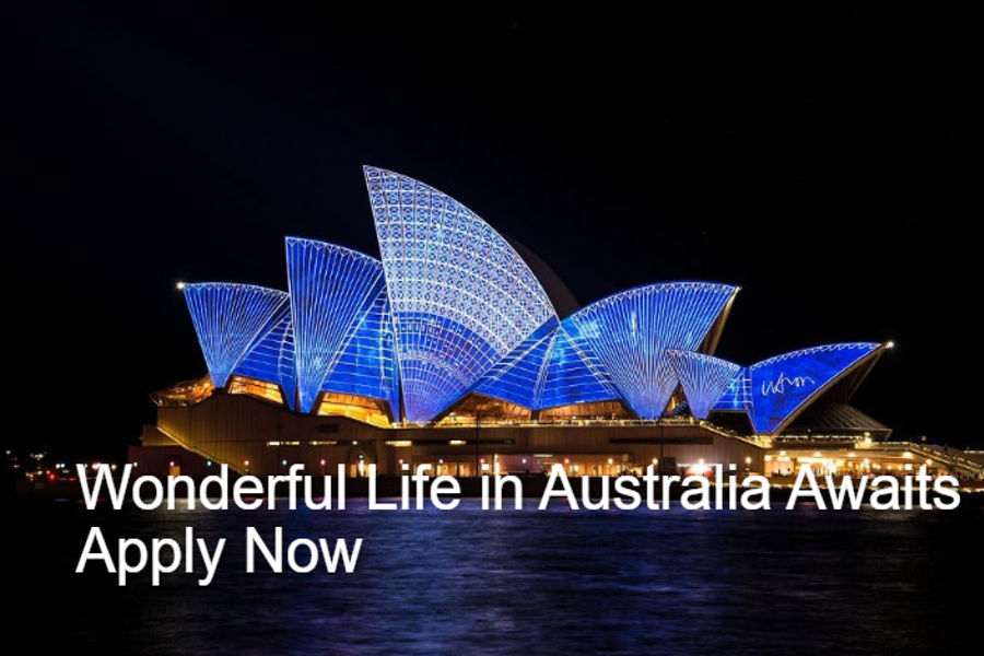 The iconic Sydney Opera House at night, bathed in a delightful bluish light, accompanied by the text "Wonderful life in Australia," highlighting the fulfilling lifestyle that comes with Jobs in Australia.