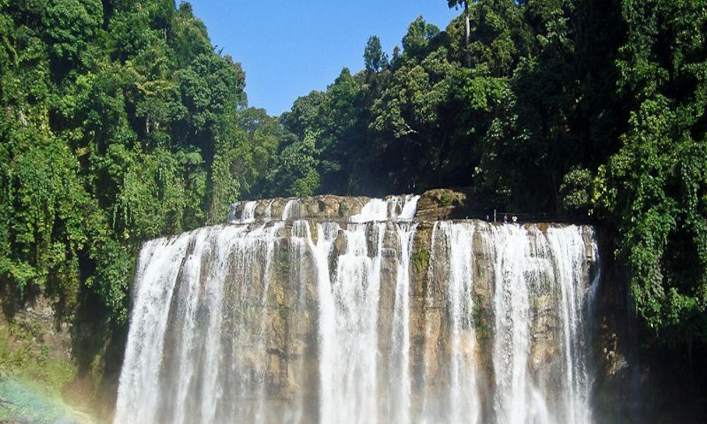 A panoramic view of the majestic Tinuy-an Waterfalls, a multi-tiered waterfalls in Surigao del Sur, serving as a key feature in any comprehensive Tinuy-an Falls travel guide for visitors planning their trip.